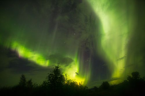 Aurora borealis over high clouds